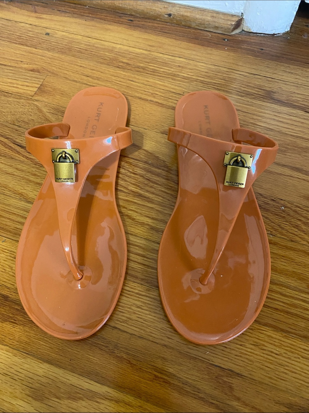Kurt Geiger Orange Jelly Thong Sandals with Gold Padlock Detail